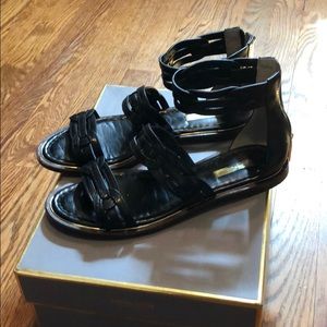 Black three strap leather sandals